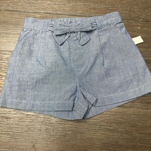 Light blue shorts with pockets and a bow at waist  size 2T
